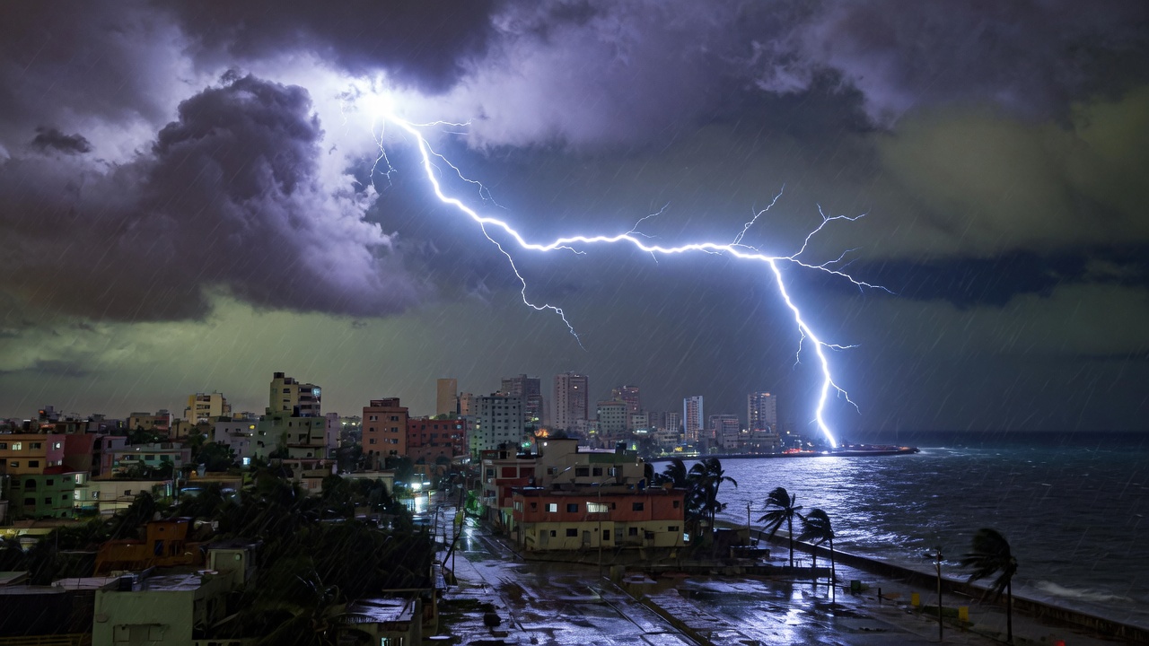 Lightning over a tropical city at night